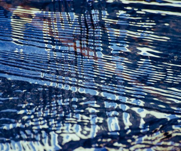 Calming blue abstract waves symbolizing visual ease